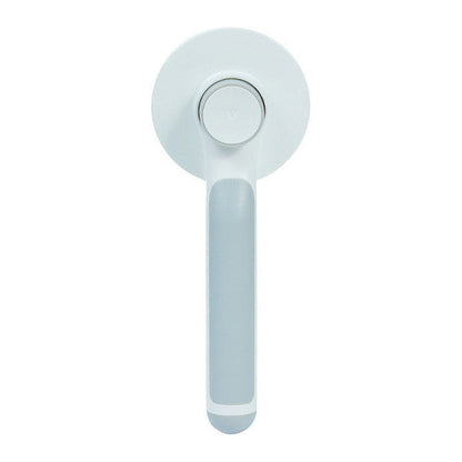 Peigne Autonettoyant à Poignée Ronde